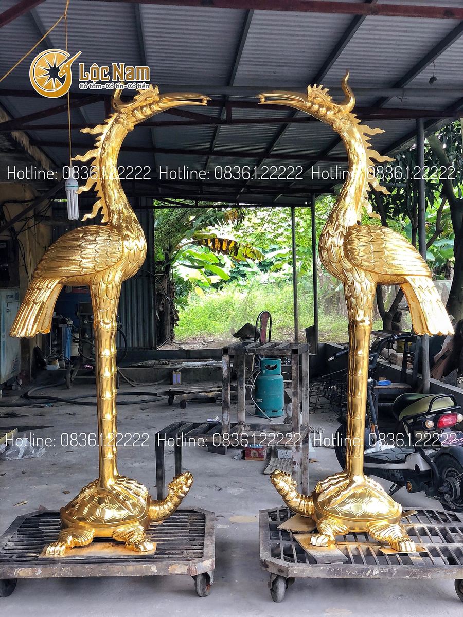Hạc thờ bằng đồng đỏ dát vàng 9999 cao 2m1